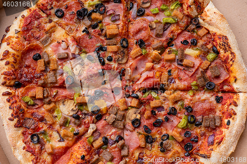 Image of Pizza in cardboard box