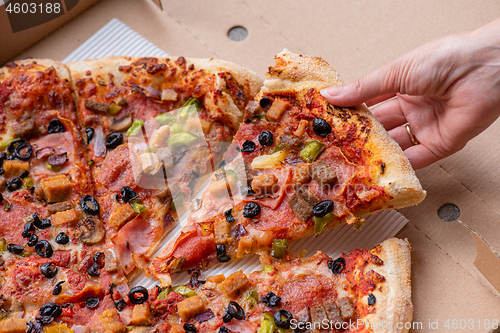 Image of Pizza in cardboard box