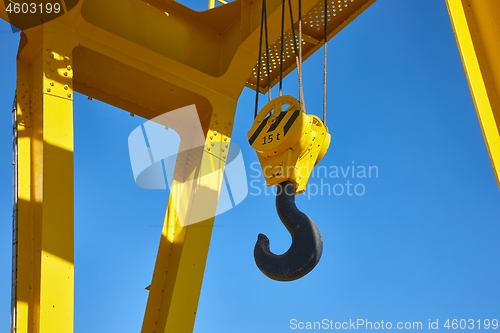 Image of Crane with hooks hanging