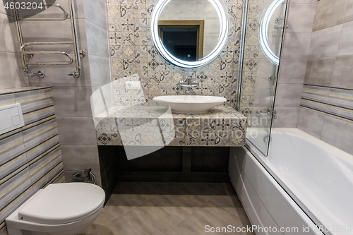 Image of Interior of a stylish modern bathroom in the apartment