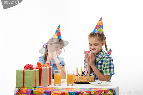 Image of Children enjoy a delicious birthday cake