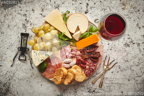 Image of Assortment of spanish tapas or italian antipasti