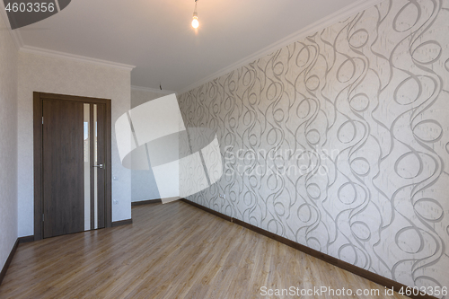 Image of The interior of the future room after renovation with wallpaper on the walls