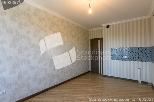 Image of Interior of renovated living room without furniture, place for kitchen headset