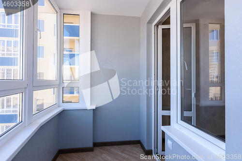 Image of Glazed balcony in the new building, view of the entrance to the balcony