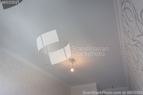 Image of Lined plastered ceilings in a rectangular room after renovation