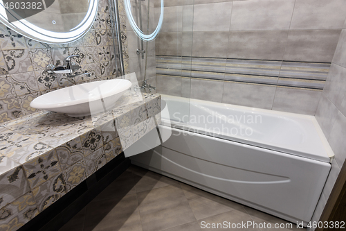 Image of The interior of a stylish compact bathroom