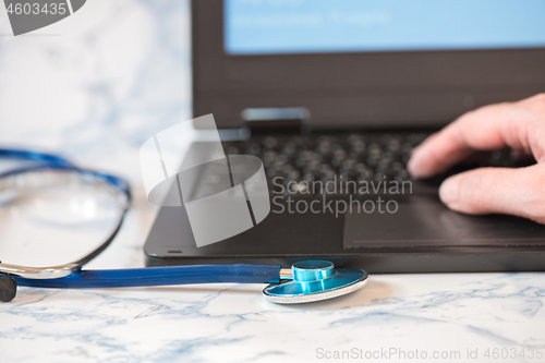 Image of Stethoscope and notebook