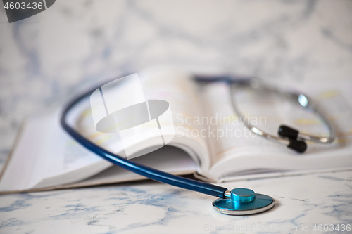 Image of Stethoscope and book