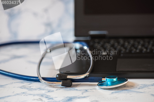 Image of Stethoscope and notebook