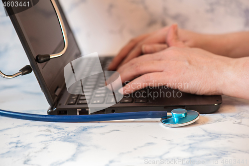 Image of Stethoscope and notebook