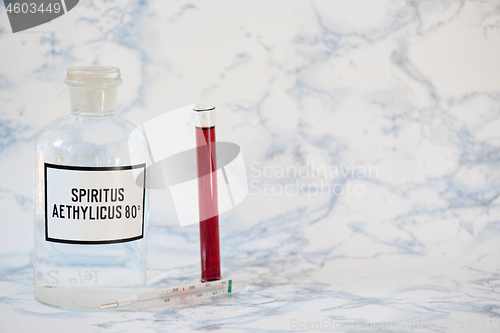 Image of Ethanol in a bottle and blood analysis