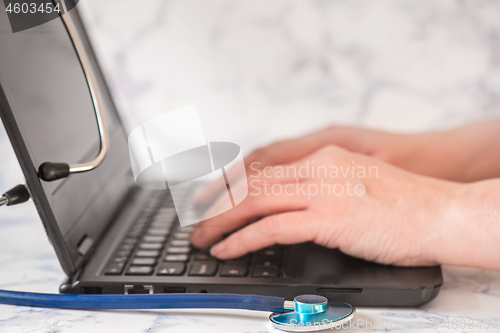 Image of Stethoscope and notebook