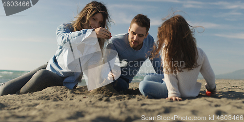 Image of Young family enjoying vecation during autumn