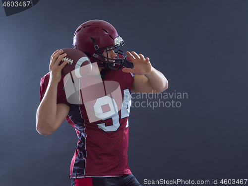 Image of american football player throwing ball