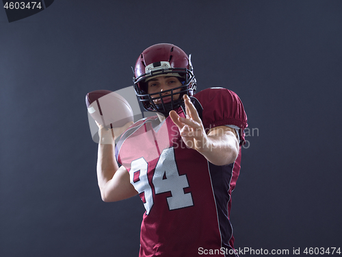 Image of american football player throwing ball