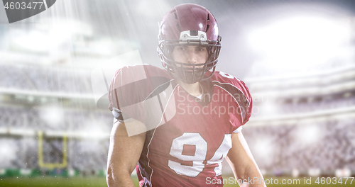 Image of American Football Player isolated on big modern stadium field