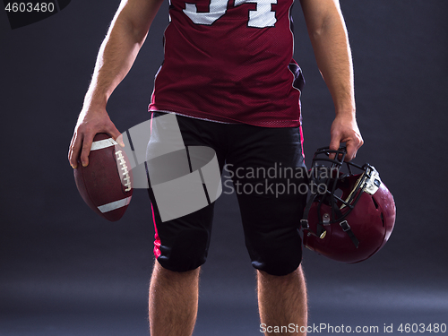 Image of closeup American Football Player isolated on gray