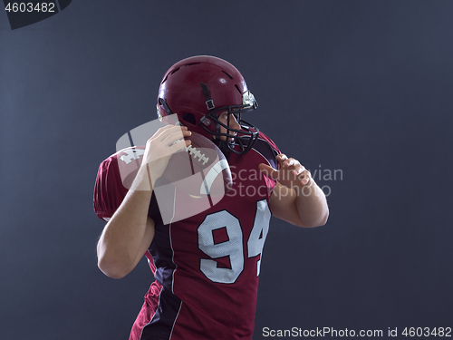 Image of american football player throwing ball