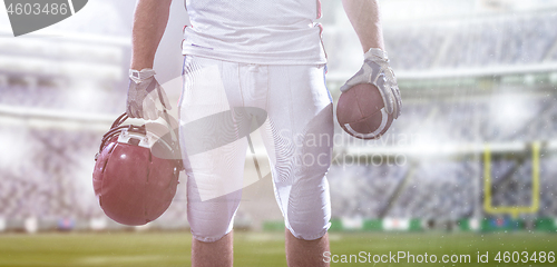 Image of closeup American Football Player isolated on big modern stadium