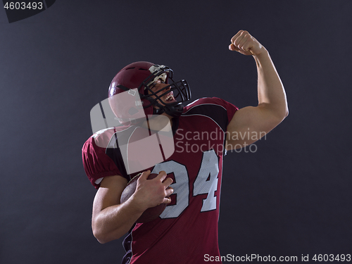 Image of american football player celebrating touchdown