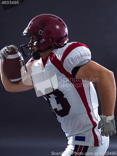 Image of American football Player running with the ball