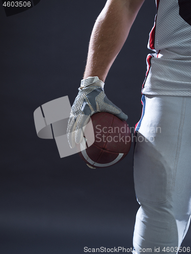 Image of closeup American Football Player isolated on gray