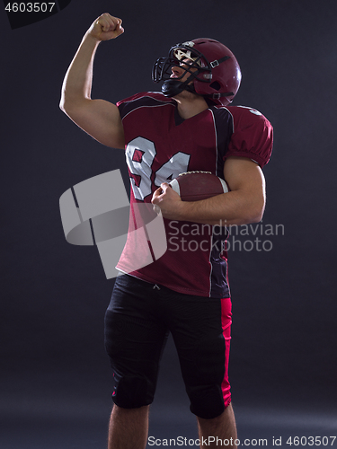 Image of american football player celebrating touchdown