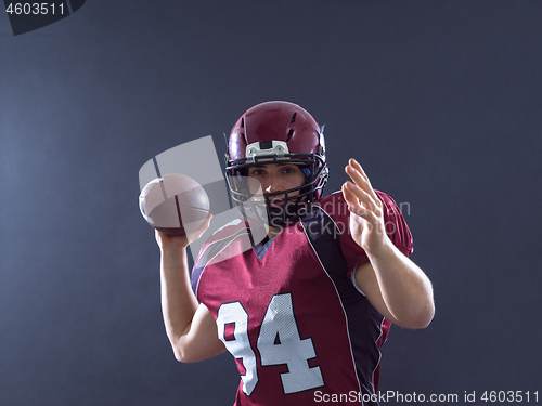 Image of american football player throwing ball