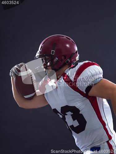 Image of American football Player running with the ball