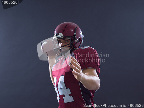 Image of american football player throwing ball