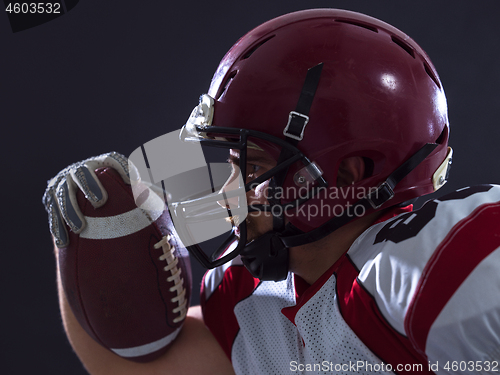 Image of American football Player running with the ball