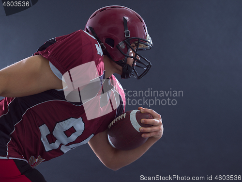 Image of American football Player running with the ball