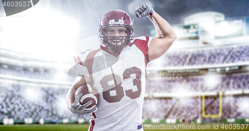 Image of american football player celebrating touchdown