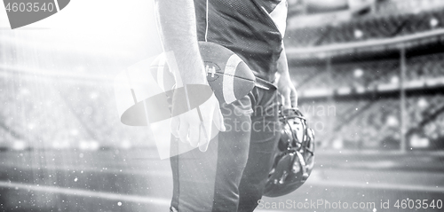 Image of closeup American Football Player isolated on big modern stadium