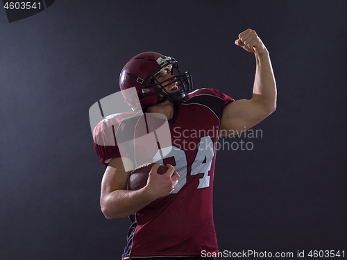 Image of american football player celebrating touchdown