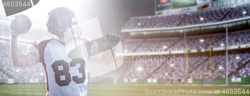 Image of american football player throwing ball