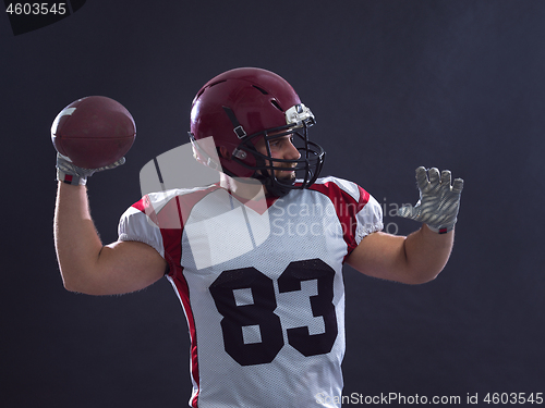 Image of american football player throwing ball