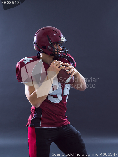 Image of american football player throwing ball