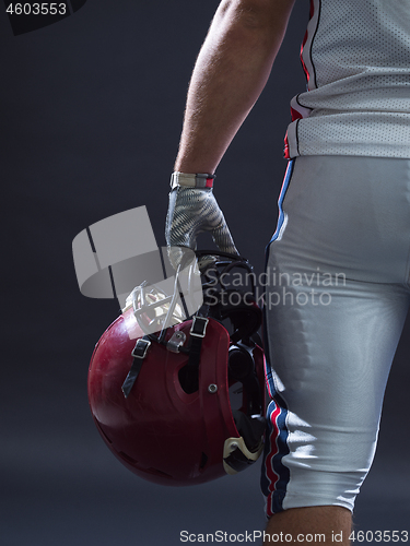 Image of closeup American Football Player isolated on gray