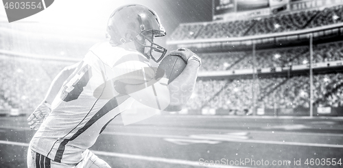 Image of american football player throwing ball