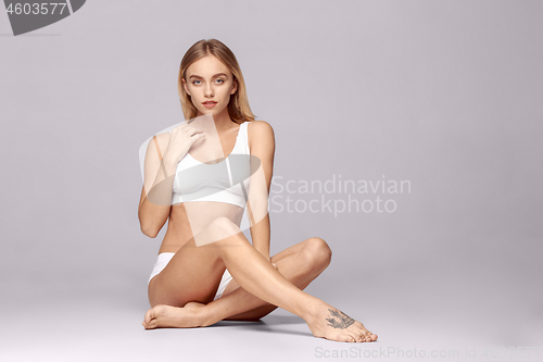 Image of Perfect slim toned young body of the girl .