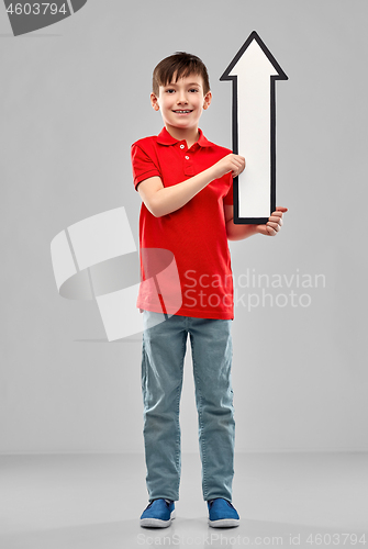 Image of boy holding big white upwards thick arrow