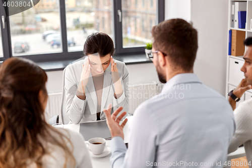 Image of recruiters having job interview with employee