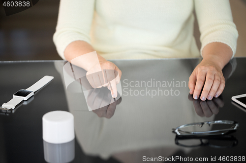 Image of close up of woman using black interactive panel