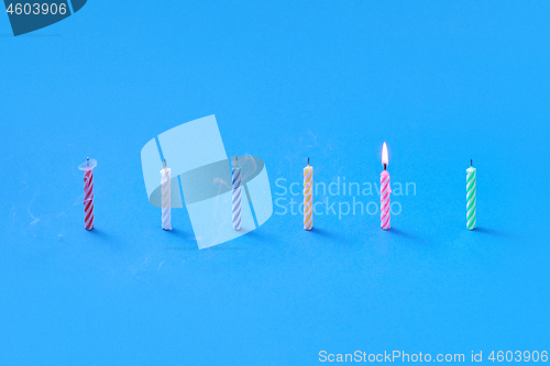 Image of Creative composition from candles for cakes and sweet dessert.