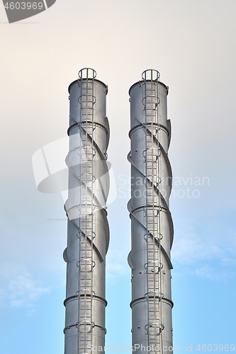 Image of Two Industrial Chimneys