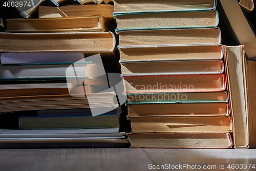 Image of Wall of books piled up