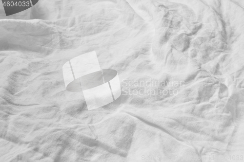 Image of Crumpled fabric white textile background.