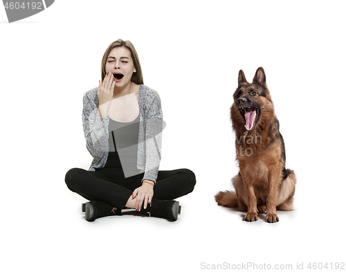 Image of Woman with her dog over white background